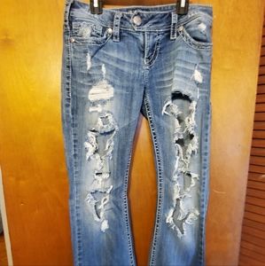 Silver boot cut destroyed jeans